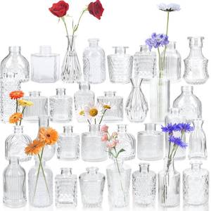 lot 7744 image: Yirilan Bud Vases Set of 32 PCS, Small Flower Vases for Table Centerpieces, Mini Vases for Single Stem Flowers, Glass Vases for Centerpieces, Wedding & Home Decor, Clear MISSING ONE