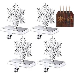 lot 8749 image: Jetika Christmas Stocking Holders for Mantle Snowflake with Diamond Stocking Hanger for Mantel Weighted Heavy Metal Stocking Hook Stand for Fireplace Counter Window Decoration, 4-Pack
