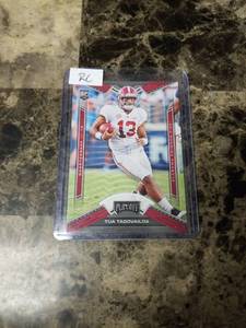 lot 1095 image: 2020 Panini Chronicles Draft Picks Playoff Tua Tagavailoa Alabama Crimson Tide Rookie Football Card