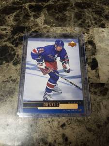 lot 1126 image: 1999 Upper Deck Wayne Gretzky New York Rangers Hockey Card