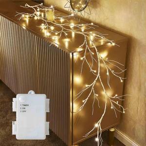 lot 49434 image: Hairui Birch Garland with Lights 6FT 48 LED Battery Operated, Lighted Twig Vine with Timer for Christmas Home Fireplace Decoration Indoor Outdoor Use - Retail $30