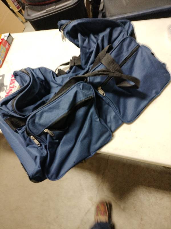 lot 33727 image: Rolling Duffle Bag