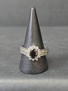 lot 58 image: 10K White Gold Black and White Sapphire Halo Ring, Stamped 10KT,  Size 9, 5.35gm