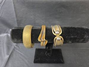 lot 274 image: Set of 3 Gold Toned Bangle Bracelets