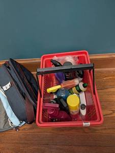 lot 2337 image: Red Storage Tote with chemicals