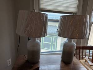 lot 2391 image: Ashley Signature White Ceramic Table Lamps with Drum Shades - Set of 2
