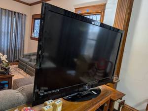 lot 2448 image: Vizio LCD TV with Stand 52 inch