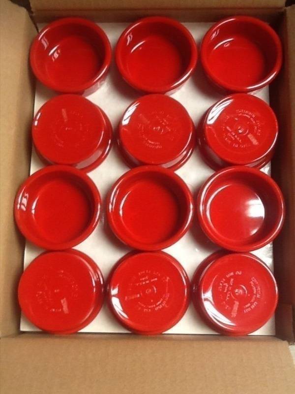 lot 121 image: Case of red 2. 5 ounce ramekins 48 in the case