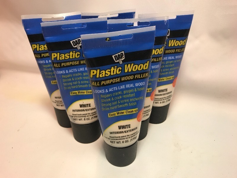 lot 9330 image: Six tubes of plastic wood great for repairs as pictured