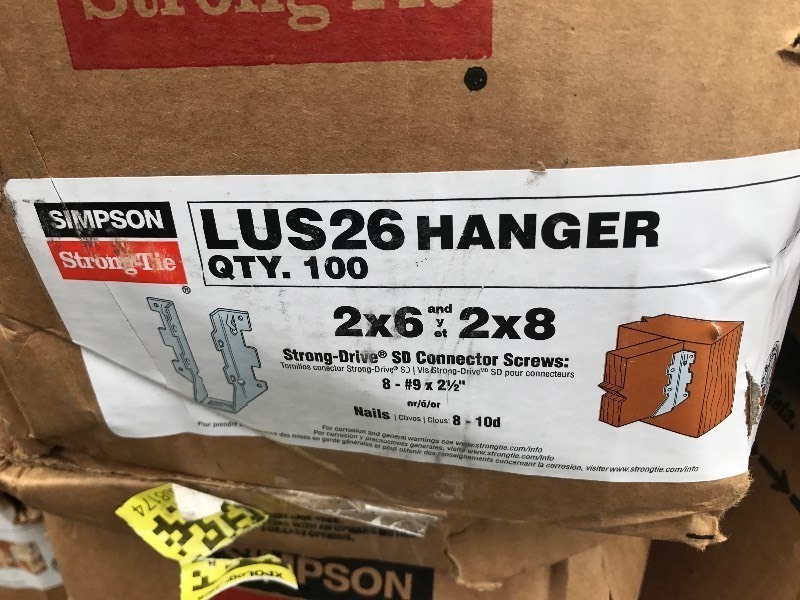 lot 9385 image: Case of 100 stud hangers as pictured