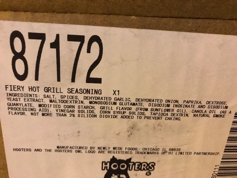 lot 9599 image: Box of hooters hot grill seasoning