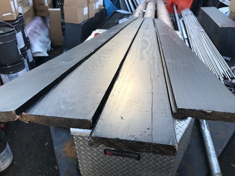 lot 9619 image: (4) long trim boards half inch by 4 x 12v
