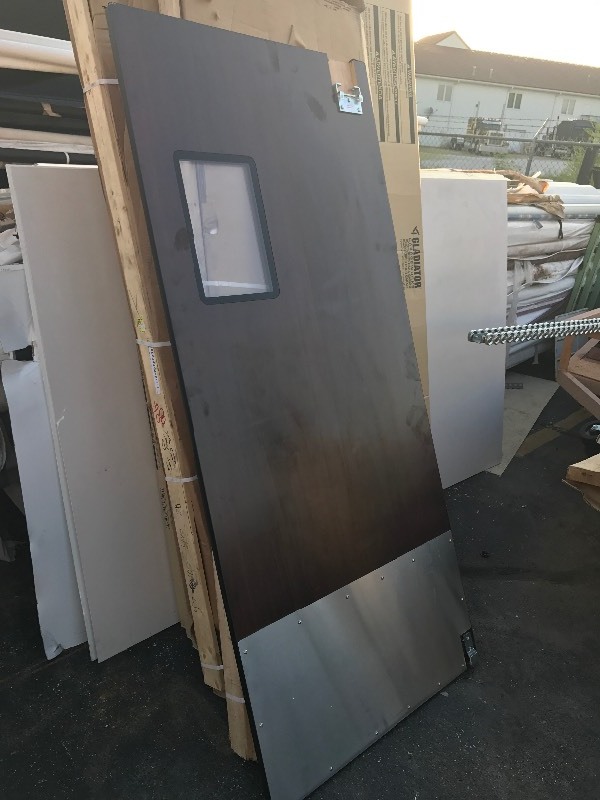 lot 805 image: New kitchen swinging door with woodgrain finish stainless steel bottom window has hardware very nice 36 x 81