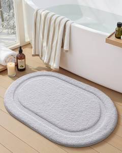 lot 25987 image: Oval White Bathroom Rugs 32x20, Extra Soft Absorbent Microfiber Bath Rugs, Non-Slip Bathroom mat, Washable Plush Bath Mats for Bathroom, Shower, Bathtub, Laundry, White - Retail $20