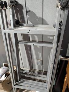 lot 849 image: Industrial Metal Storage Rolling Clothing Rack with Casters