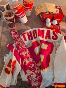 lot 1570 image: Kansas City Chiefs Thomas Jersey and Memorabilia Set