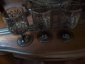 lot 1582 image: Black Stem Wine Glasses with Scroll Pattern