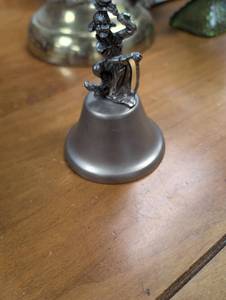 lot 313 image: Decorative Cast Iron Bell with Folk Art Figure