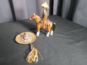lot 2882 image: Mexican Folk Art Set - Carved Wood Rider and Woven Hat
