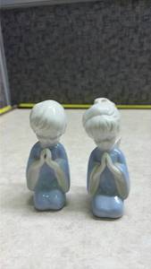 lot 1063 image: Pair of Blue and White Porcelain Praying Angel Figurines