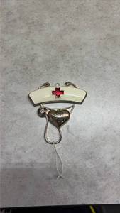 lot 1111 image: Best Nurse Decorative Ornament with Heart. (SSGrandma)