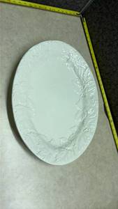 lot 1116 image: World Market White Leaf Pattern Oval Serving Platter. (SS)