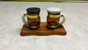 lot 1164 image: Fort Davis Salt and Pepper Shaker Set with Wooden Base. (SS)
