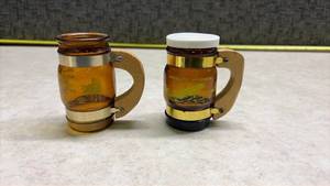 lot 1171 image: Marvelous Minnesota Souvenir Salt & Pepper Shakers - one missing a lid. (SS)