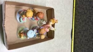 lot 1177 image: Avon Heavenly Moments Figurine Collection