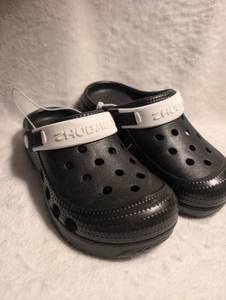 lot 2128 image: Chubaca Black and White Crocs Clogs - Youth Size 33.5