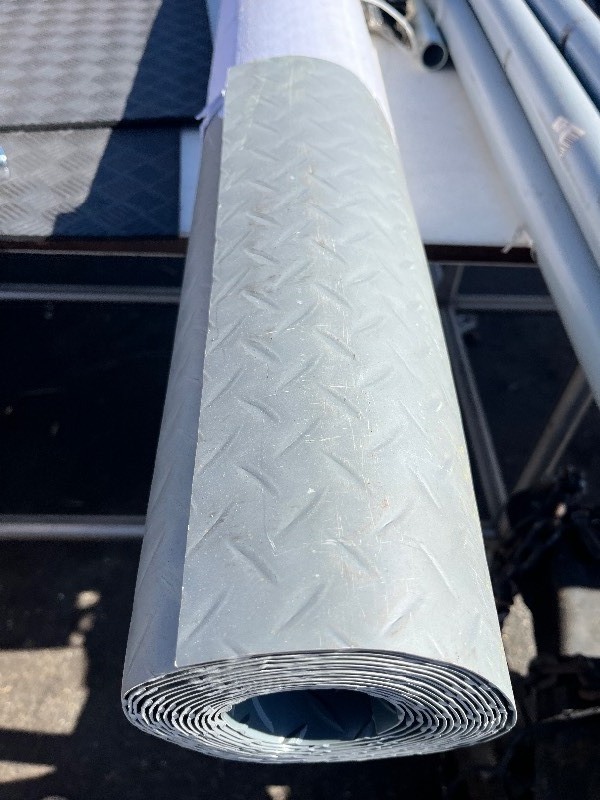 lot 38 image: 7.5x20 ft Garage Floor Mat, 2.8 mm Thickened Non-Slip PVC, Diamond Plate Protector for SUVs, Trucks, Sports Cars, Indoor Use - contains sm Blemish See images Retails $219