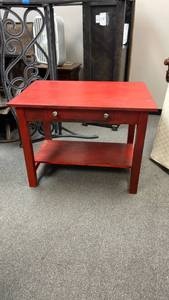 lot 100 image: Red wooden single drawer desk 27 x 36 x 24 in