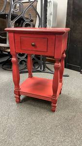 lot 102 image: Red wood single drawer side table 28 x 18 x 14 in