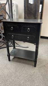 lot 104 image: Black wood 3 drawer side table 30 x 24 x 14 in