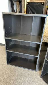 lot 123 image: Black bookcase 40 x 25 x 12 in