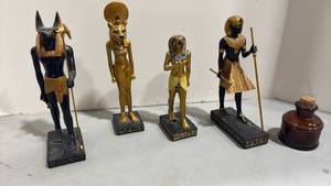 lot 1013 image: Egyptian Gods Decorative Figurine Set with Amber Glass Bottle
