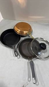 lot 1048 image: Mixed Cookware Set with Cast Iron Skillet and Copper Pan
