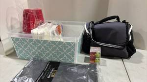 lot 1056 image: Plastic Table Cover, Cups, Napkins, Matches and Lunch Box