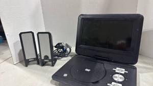 lot 1064 image: Portable dvd player and dell speakers