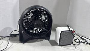 lot 1065 image: Honeywell table fan and small mainstays heater
