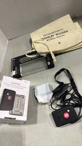 lot 1073 image: Fast help, phone case and canvas bank bags