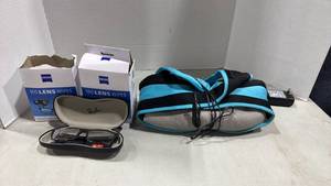 lot 1077 image: Ray Ban prescription glasses, ��lens wipes and neck massager