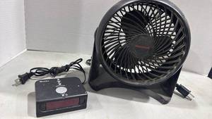lot 1080 image: Honeywell table fan and westclox alarm clock