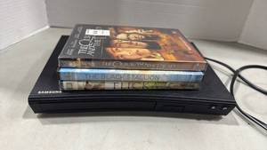 lot 1086 image: Samsung dvd player and DVDs