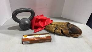 lot 1098 image: Baseball glove, kettlebell, resistance band and Fiebings saddle soap set