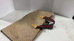 lot 1107 image: Garment bag possible Gucci
