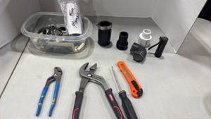lot 1134 image: Adjustable Wrench, plumbing supplies and more