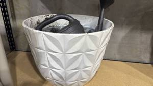 lot 1138 image: Plastic planter with watering can 14x17