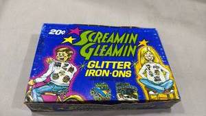 lot 2034 image: Screamin Gleamin Glitter Iron-Ons 36 Count Box