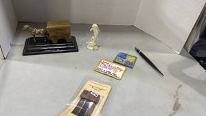 lot 2048 image: Lenox dolphin figurine, figurine from the 100th anniversary of HS Badcock Corporation, and more